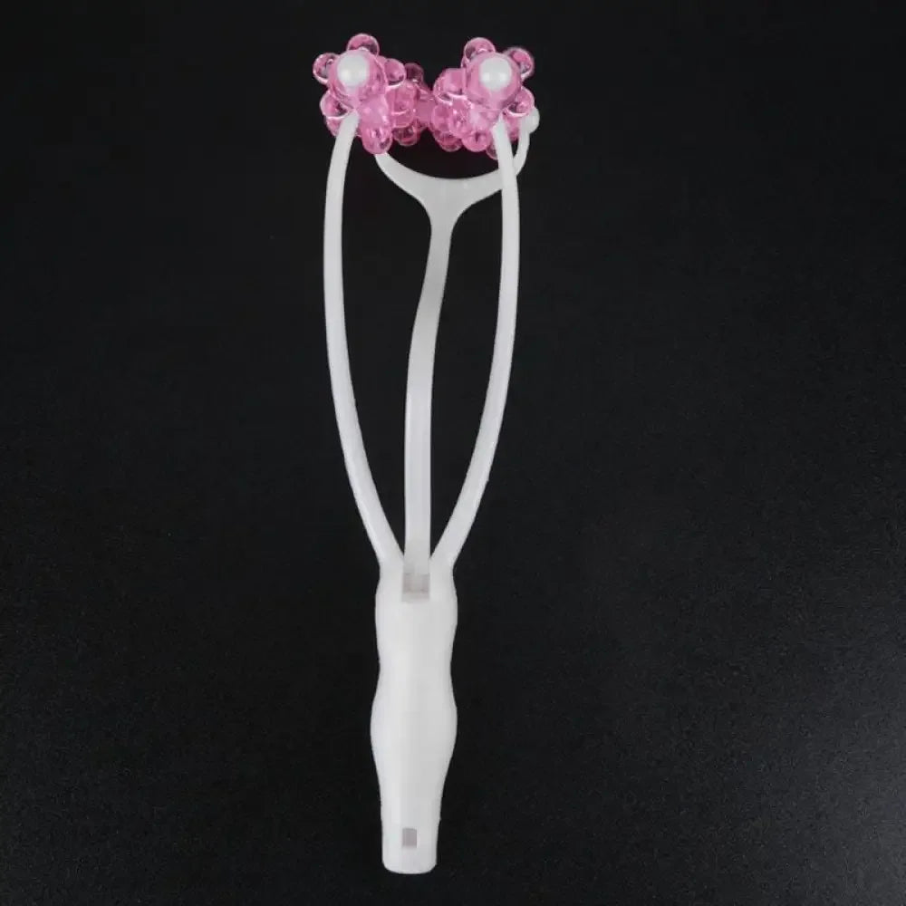 White eyelash curler with pink floral accents for face roller collagen production