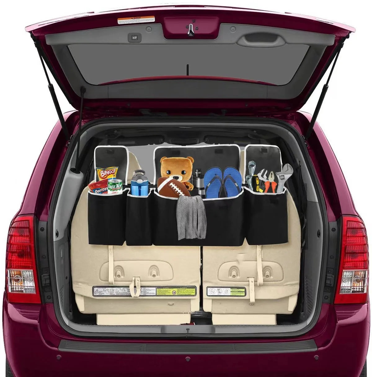 Car trunk with a cargo organizer holding various items on a white background