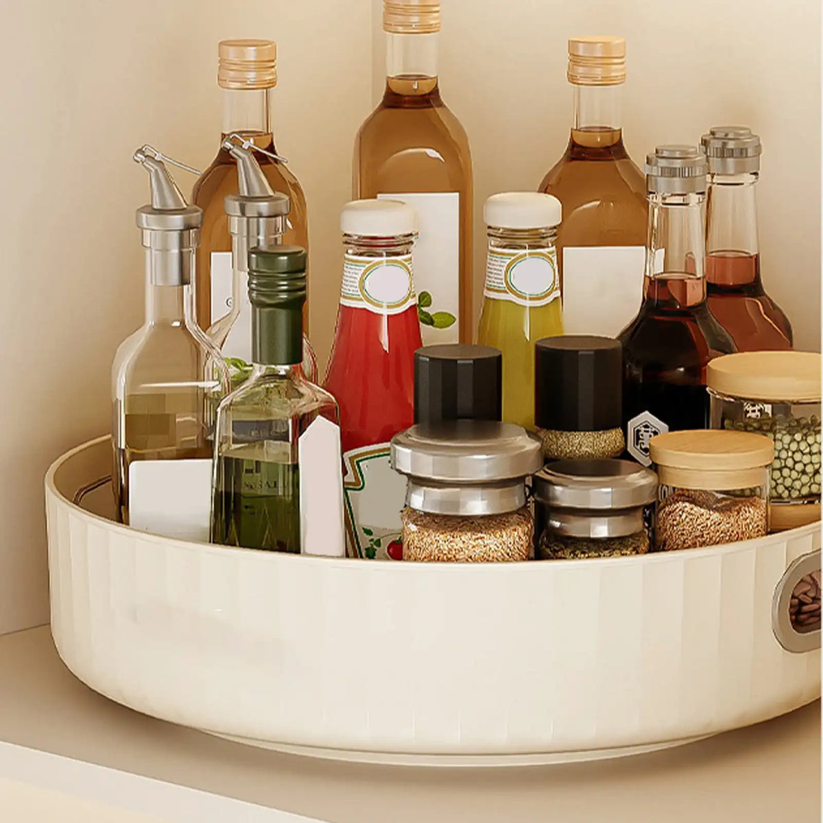 Collection of condiments and oils on a white tray against a beige background