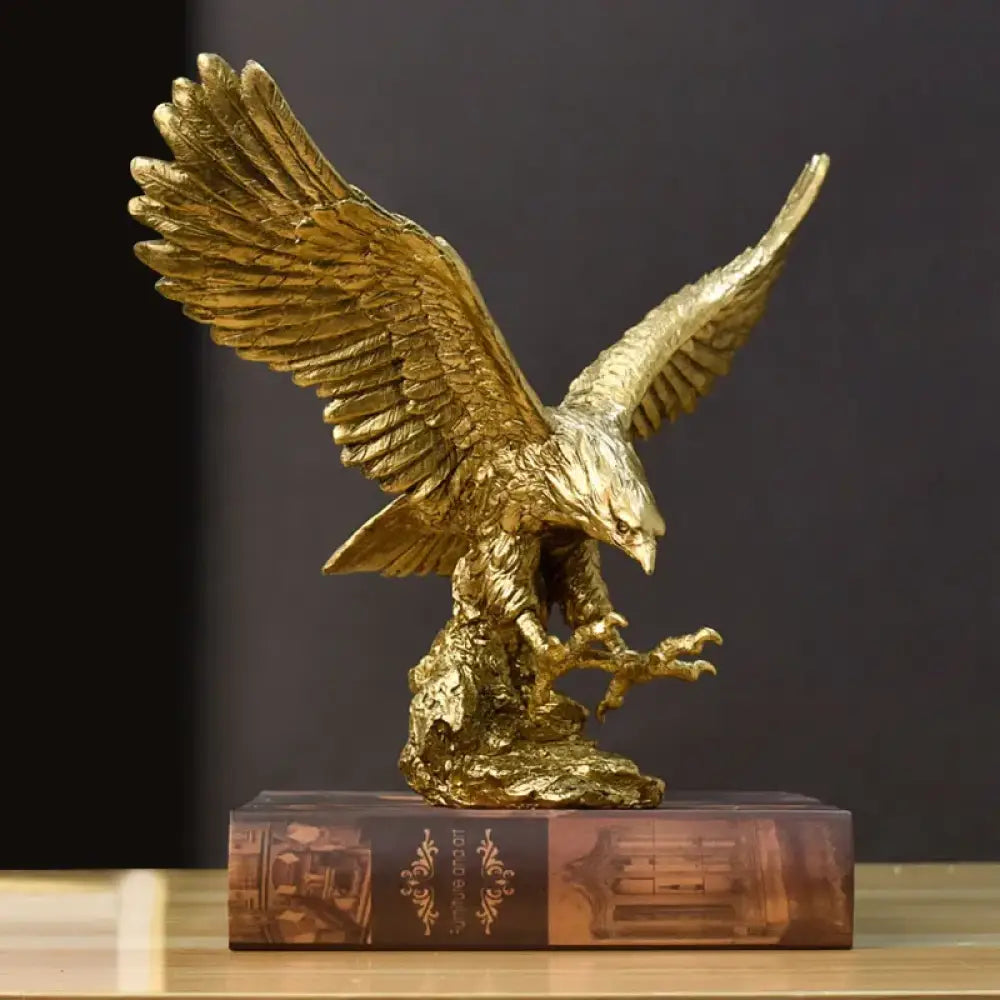 Gold eagle statue on a dark background