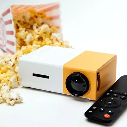 1080p Mini Home Projector with yellow white LED light, remote, popcorn