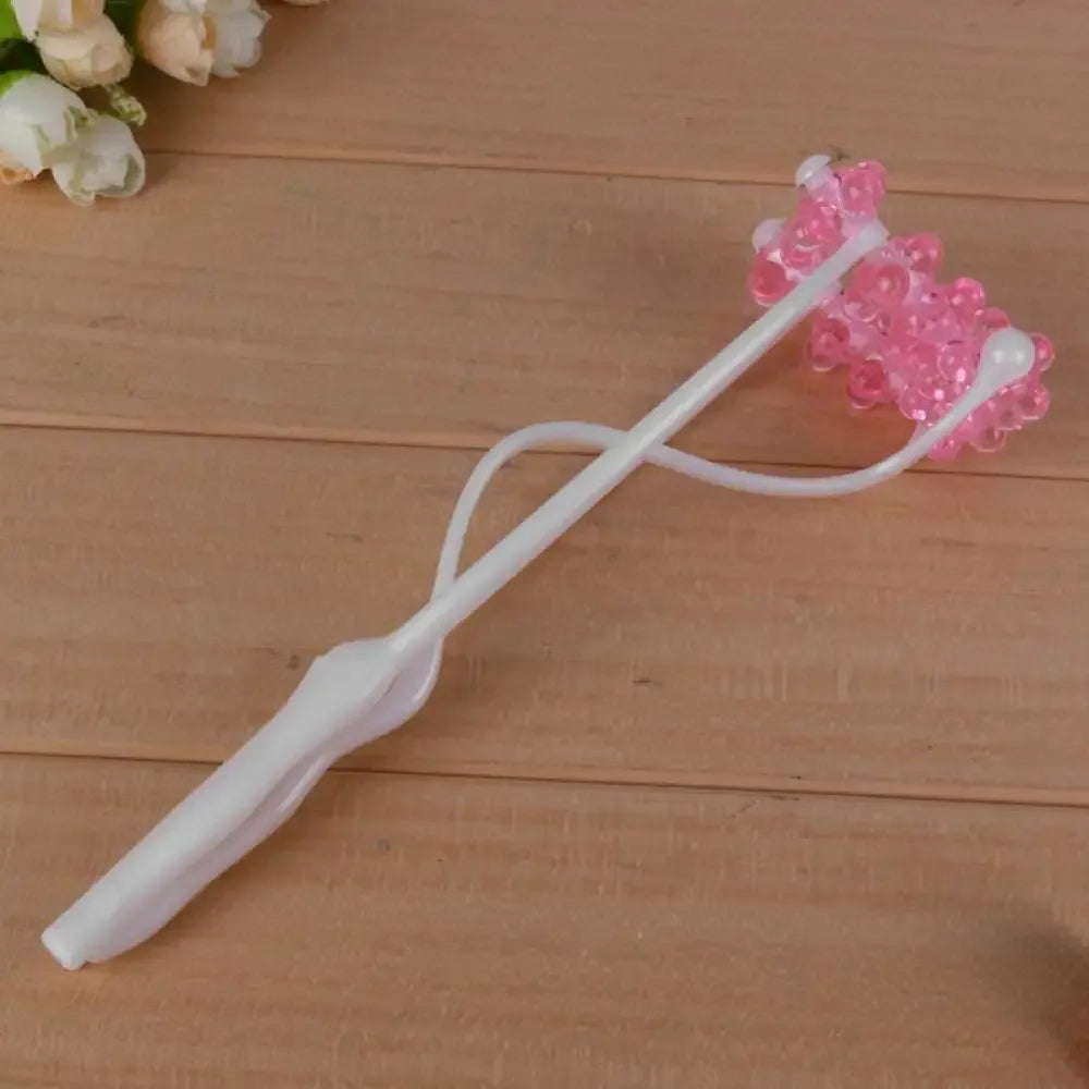 Pink beaded massage wand for 2-in-1 face roller to boost collagen production