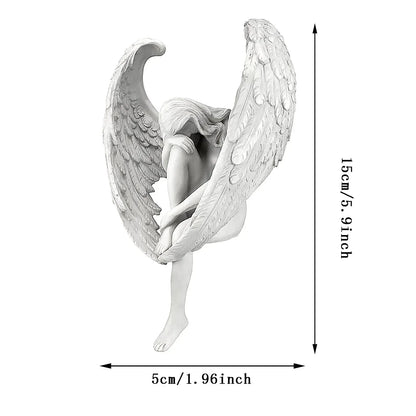 White angel figurine with dimensions indicated on a white background