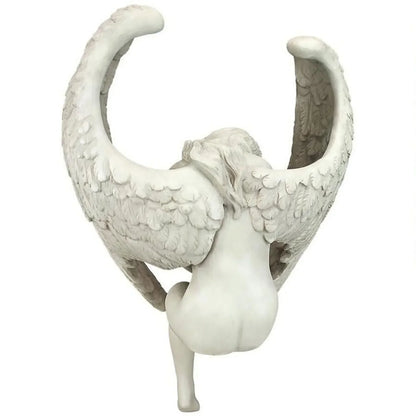 Decorative white vase shaped like a ram's head on a white background
