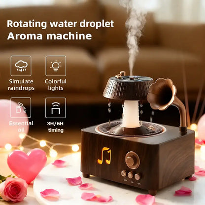 Aroma machine with steam rising, surrounded by decorative items like flowers and lights.