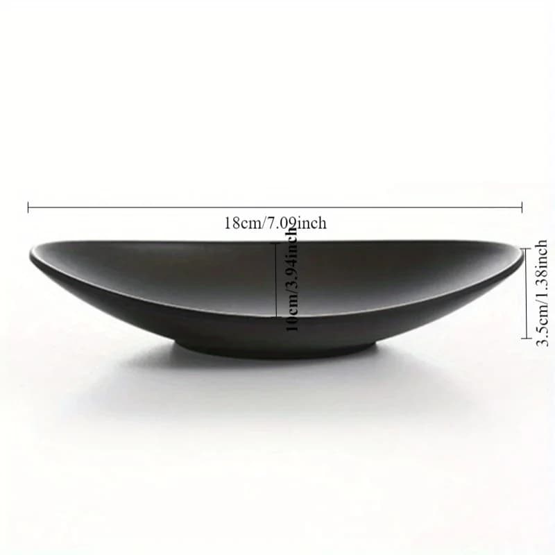 Black ceramic bowl with dimensions on a white background
