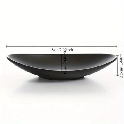 Black ceramic bowl with dimensions on a white background