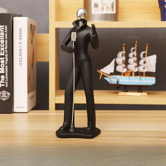 Black figurine of a person with a helmet on a wooden shelf with books and a model ship.