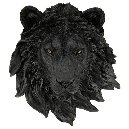 Black lion head wall decoration on a white background