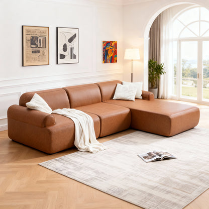 Brown sectional sofa in a living room with decor elements.