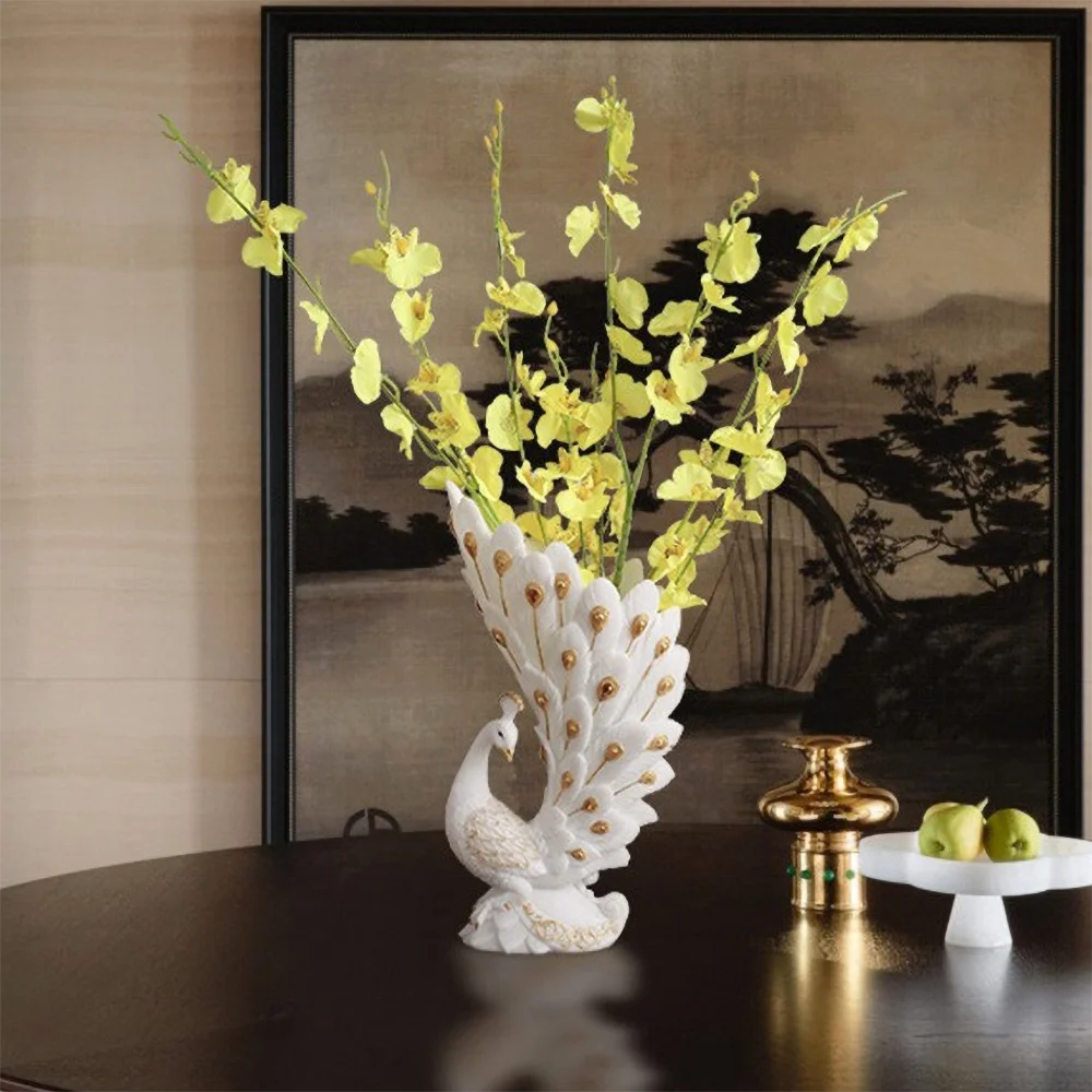 Decorative peacock vase with yellow flowers against a scenic painting background
