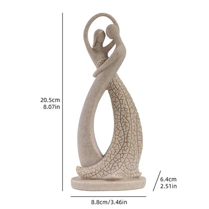 Decorative sculpture of two figures embracing with measurements on a white background