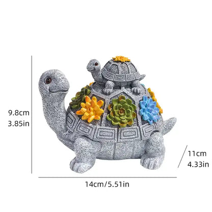 Decorative turtle sculpture with succulents and measurements on a white background
