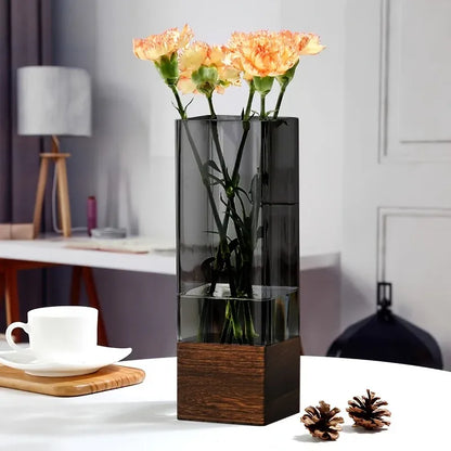Decorative vase with flowers on a table in a room setting