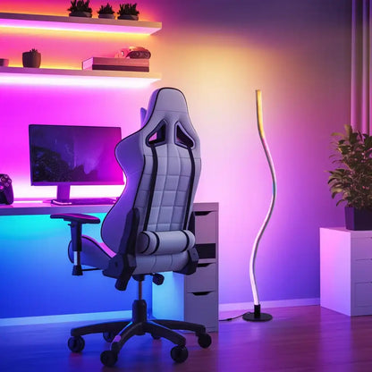 Ergonomic chair in a room with colorful lighting and a desk setup.