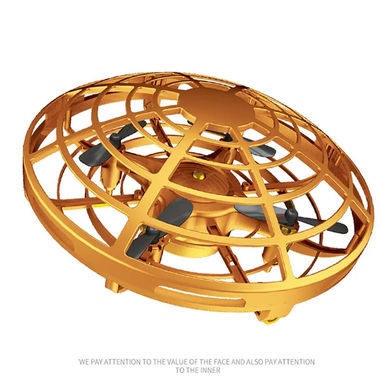 Gold-colored drone with a circular design on a white background