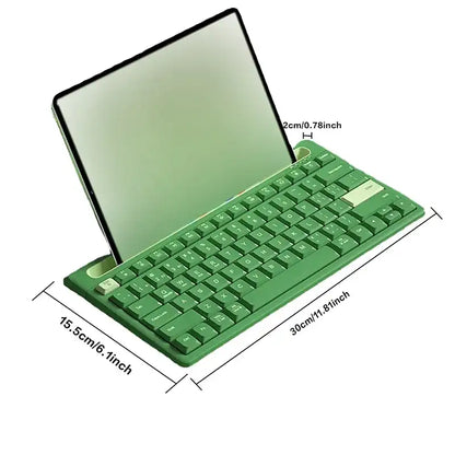 Green keyboard and tablet with dimensions indicated on a white background