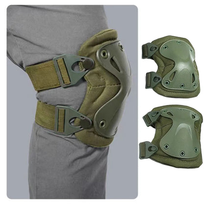 Green knee pads with straps worn by a person on a gray background