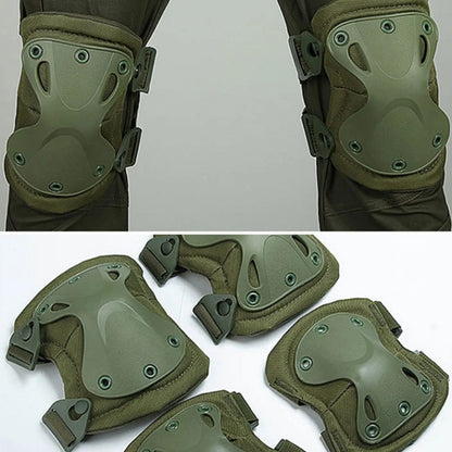 Green knee pads with straps on a white background