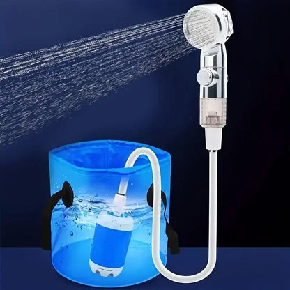 Handheld showerhead with hose and blue bucket on a dark background
