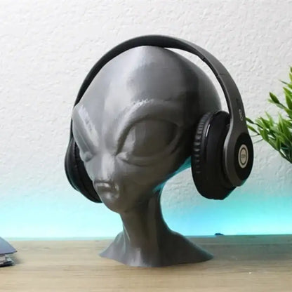 Headphones on a mannequin head with a blurred background