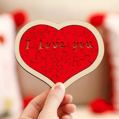 Heart-shaped puzzle with 'I love you' on a blurred background