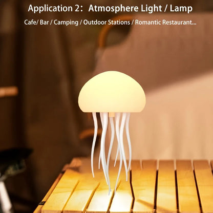 Jellyfish-shaped lamp on a wooden surface with a warm glow, suitable for cafes, bars, camping, outdoor stations, and romantic restaurants.