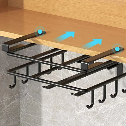 Black metal rack with hooks attached to a wooden surface, showing air circulation arrows.