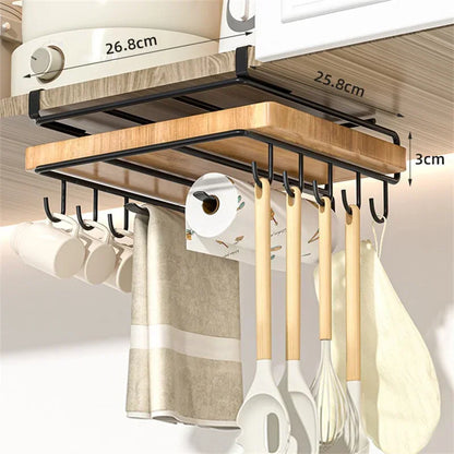 Kitchen organizer with hooks holding utensils and a paper towel roll, mounted under a cabinet.