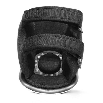 Black Knee massager with a central circular component on a white background
