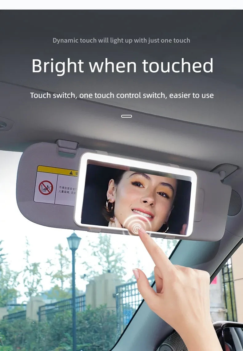 Car visor with a touch screen display and a hand touching it, with text about dynamic touch.