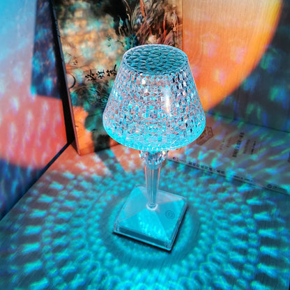 Decorative lamp with blue light on a reflective surface
