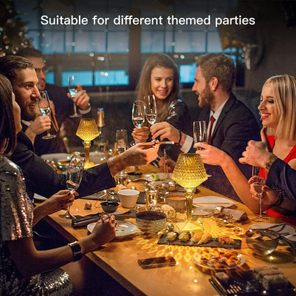 Group of people enjoying a dinner party with drinks and appetizers.