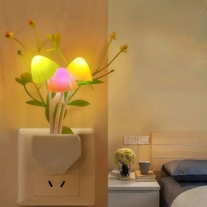 Colorful night light attached to a wall socket in a bedroom setting.