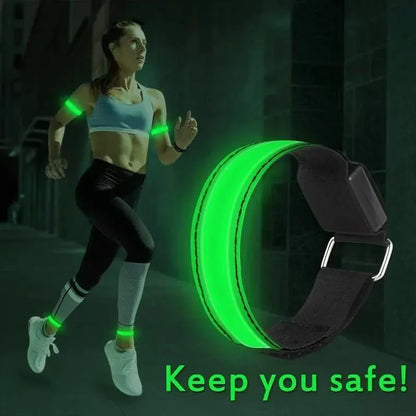 Person running with glowing green bands and a watch, text 'Keep you safe!' on a dark background