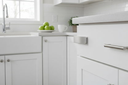 Ultra-thin magnetic door stopper installed on a kitchen cabinet door keeping it firmly closed showing 3mm slim profile