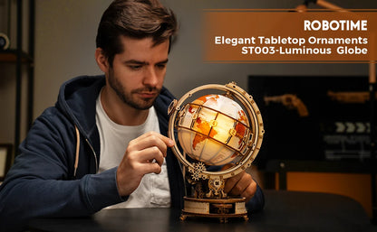 Man holding a glowing world globe with 'ROBOTIME' branding in the corner.