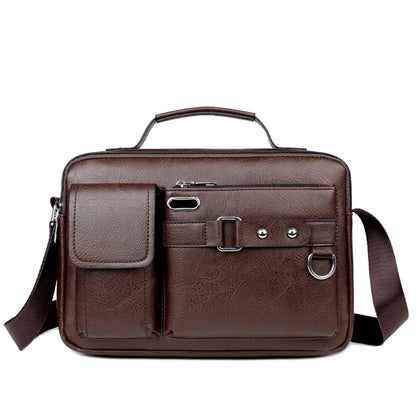 Brown leather briefcase with shoulder strap on a white background