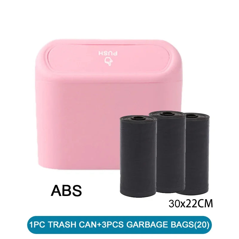 Pink trash can with three black garbage bags on a white background