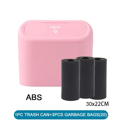 Pink trash can with three black garbage bags on a white background