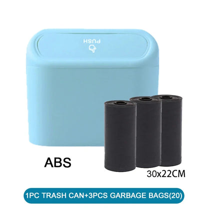 Blue trash can with three black garbage bags on a white background