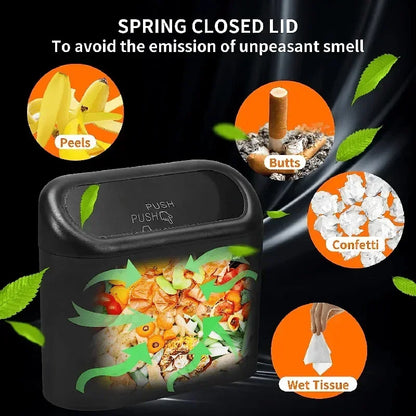 Black trash can with spring closed lid featuring images of peels, butts, confetti, and wet tissues.