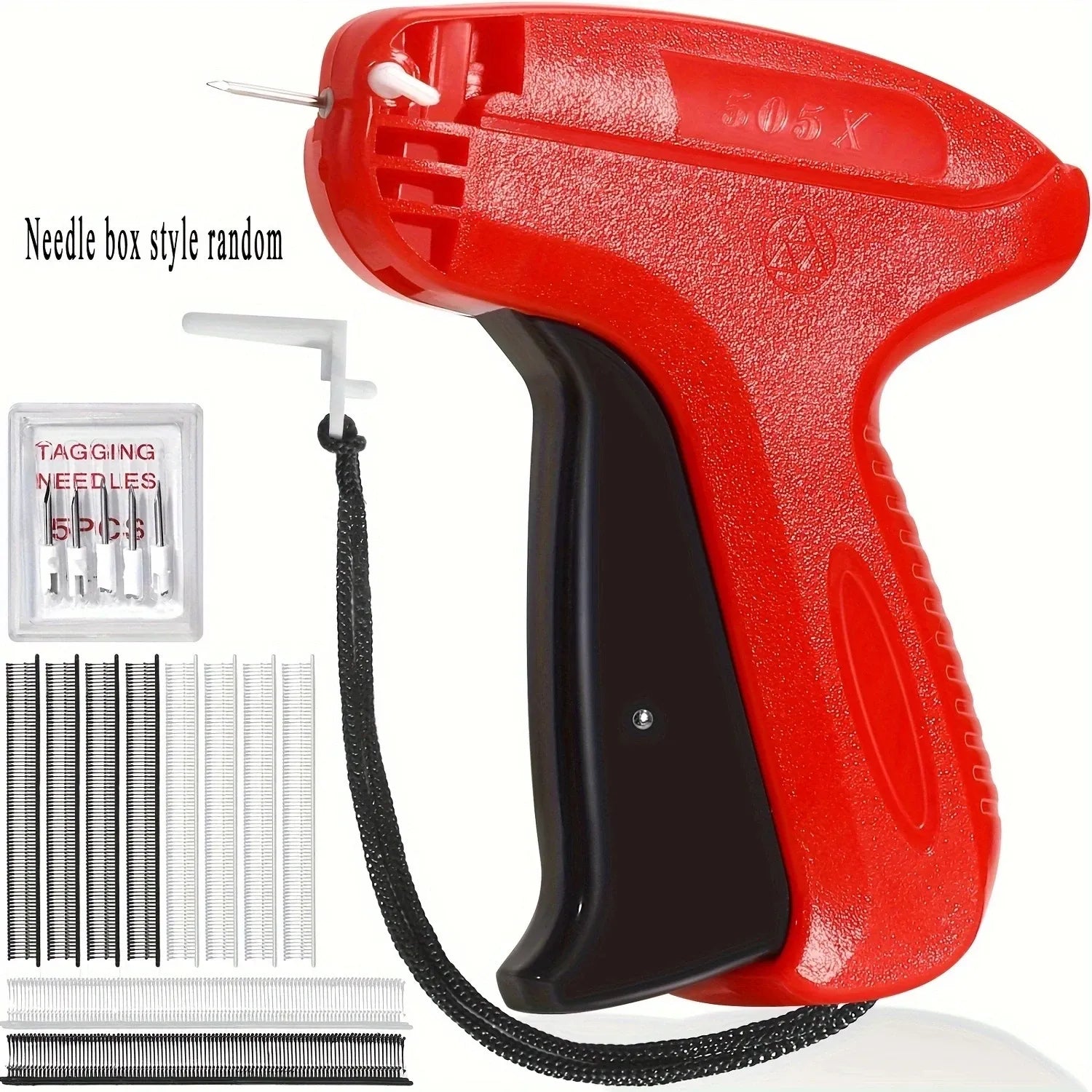 Red and black tagging gun with needles and needle box on a white background