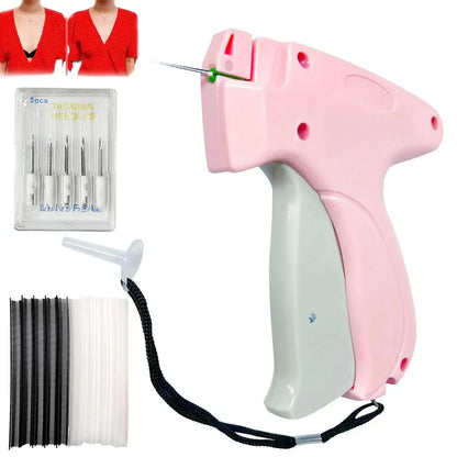 Pink and gray garment tag gun with needles and black and white strings on a white background