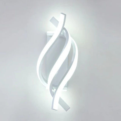 Modern wall-mounted light fixture with a white, wavy design on a gray background