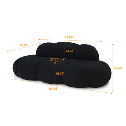 Black cloud-shaped pillow with measurements on a white background