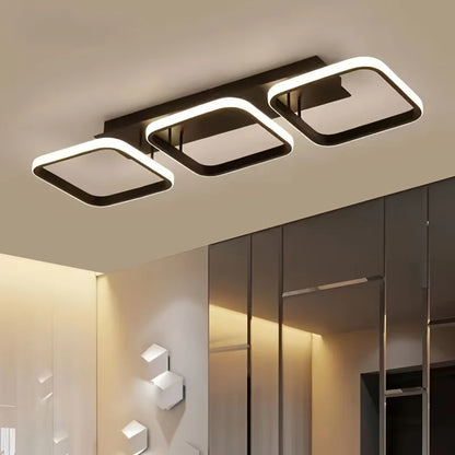 Modern ceiling light fixture with a square design in a room setting