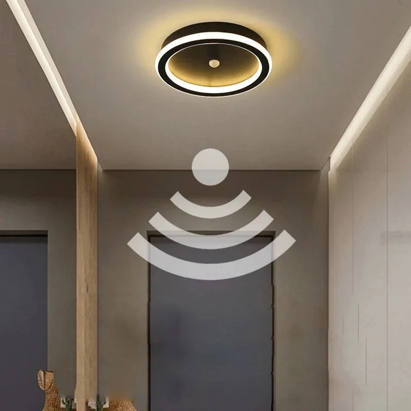 Modern ceiling light fixture in a room with a Wi-Fi signal icon overlay.