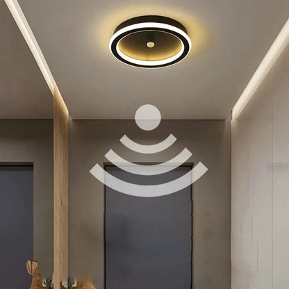 Modern ceiling light fixture in a room with a Wi-Fi signal icon overlay.