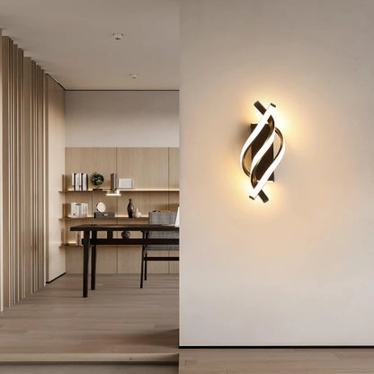 Modern wall sconce in a stylish interior setting with a desk and shelves.